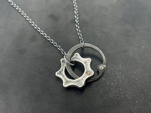 Clutch and Gear Necklace