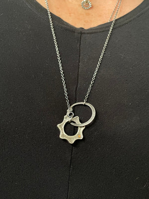 Clutch and Gear Necklace