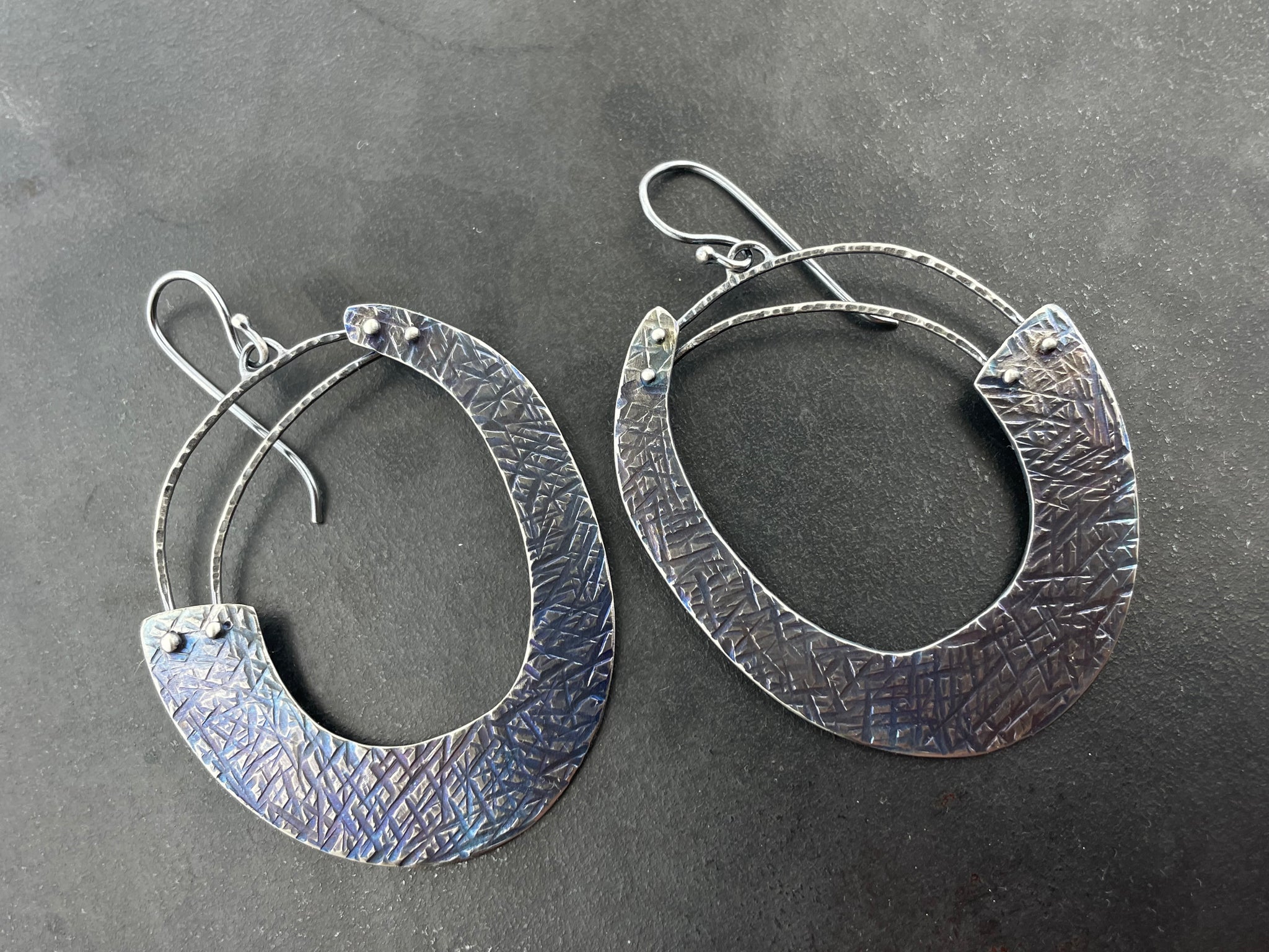 Large Rise and Titanium round earrings